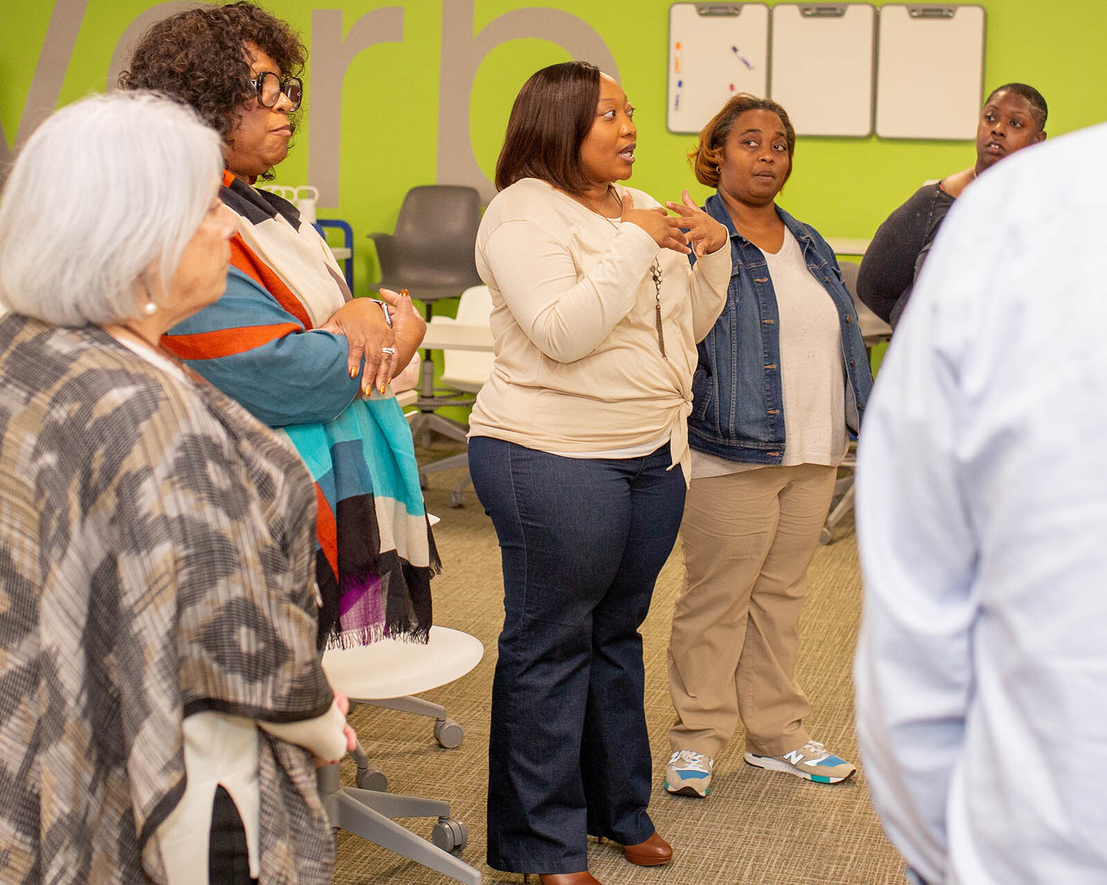 A team of educators use collective leadership tools to discuss the impact of their work.